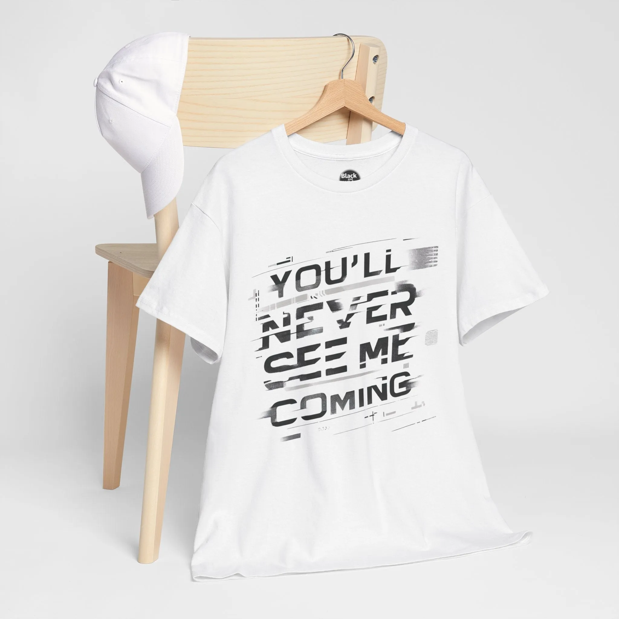 Unisex Heavy Cotton Tee - 'You'll Never See Me Coming' Bold Graphic Shirt - Statement Tee for Men & Women - Soft & Durable Casual Streetwear