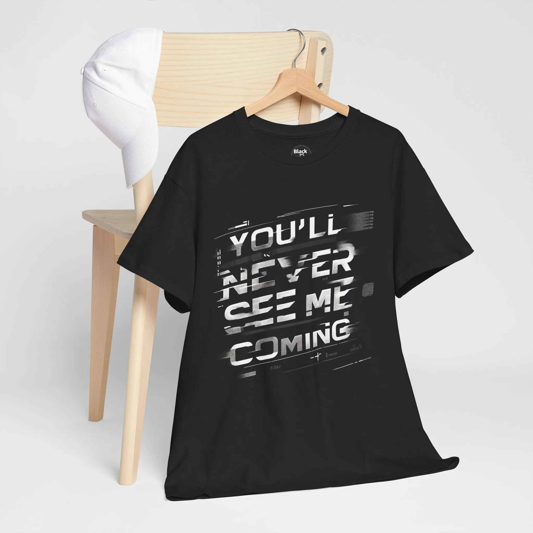 Unisex Heavy Cotton Tee - 'You'll Never See Me Coming' Bold Graphic Shirt - Statement Tee for Men & Women - Soft & Durable Casual Streetwear