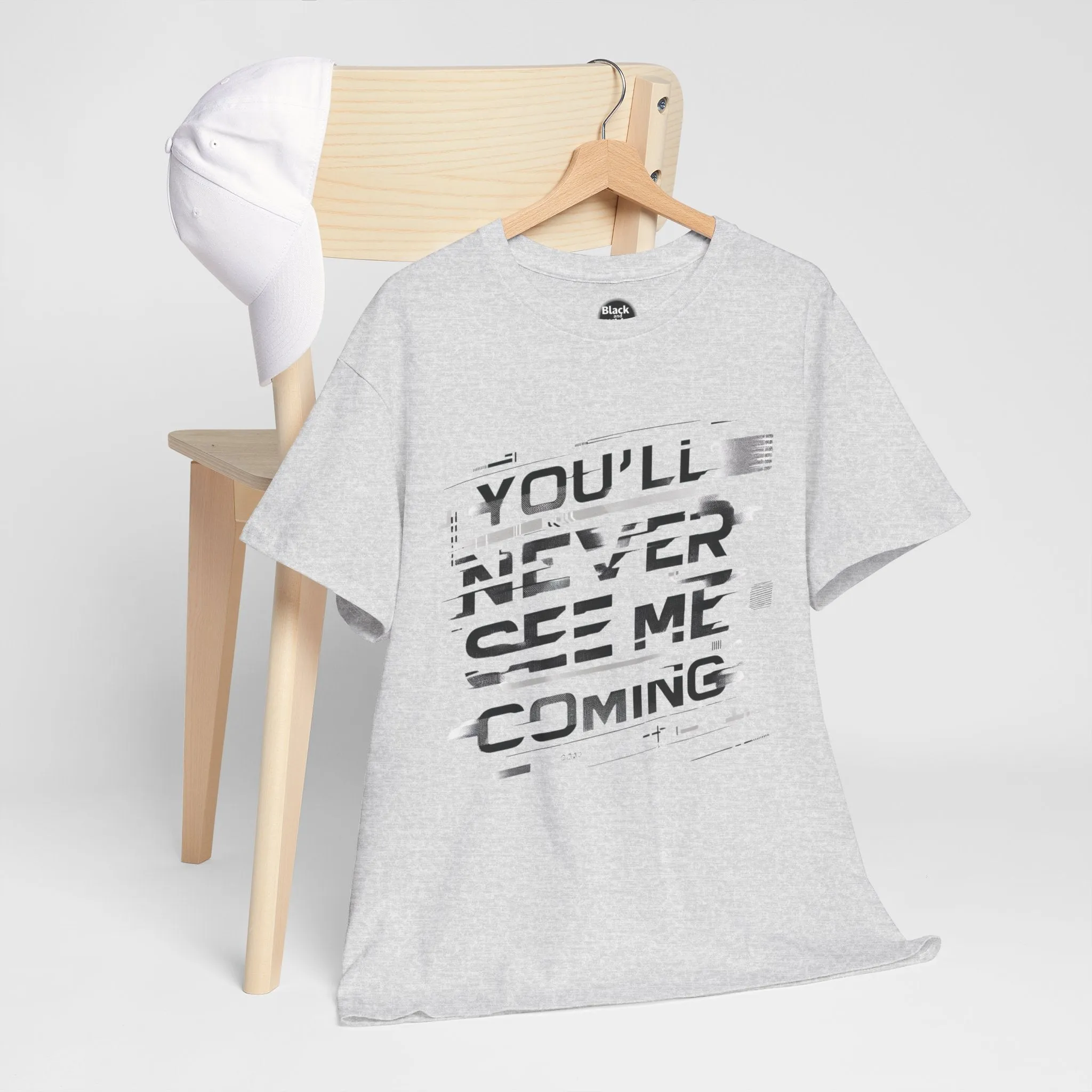 Unisex Heavy Cotton Tee - 'You'll Never See Me Coming' Bold Graphic Shirt - Statement Tee for Men & Women - Soft & Durable Casual Streetwear