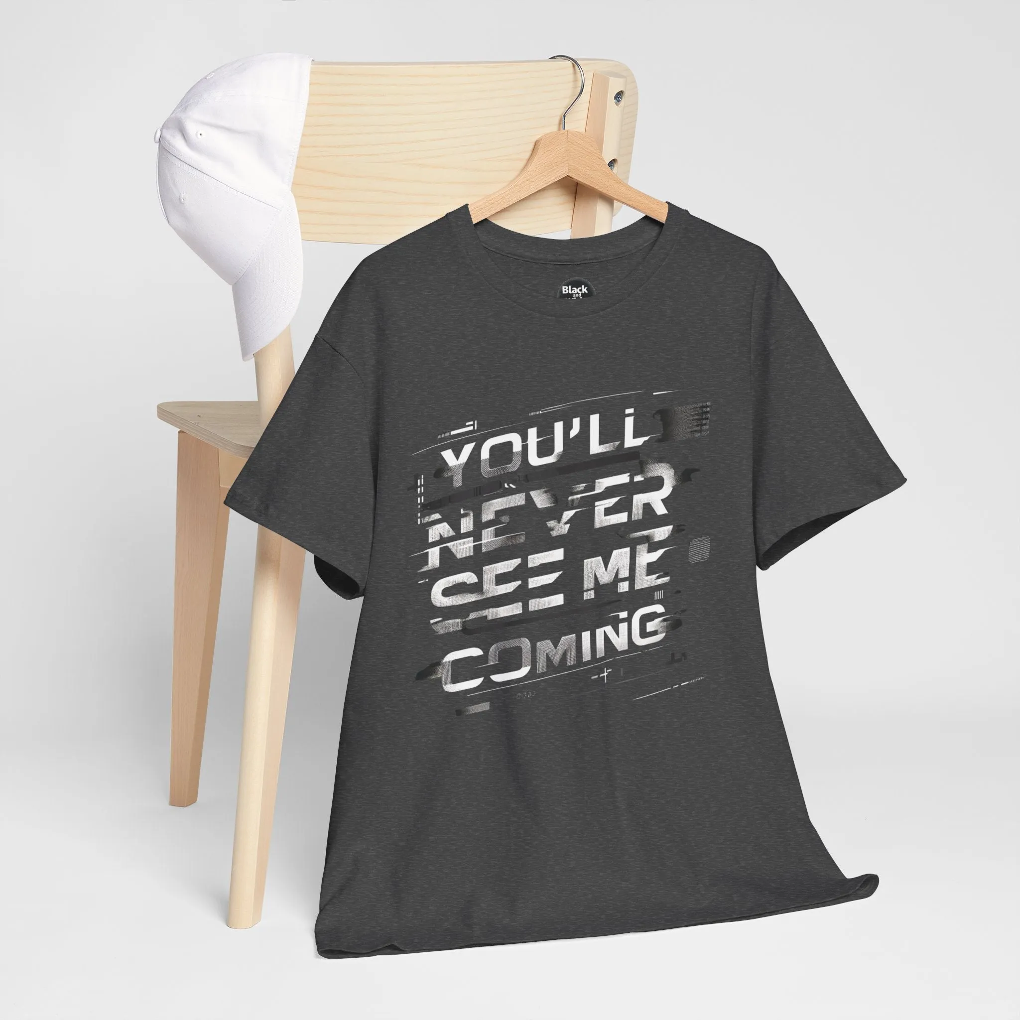Unisex Heavy Cotton Tee - 'You'll Never See Me Coming' Bold Graphic Shirt - Statement Tee for Men & Women - Soft & Durable Casual Streetwear