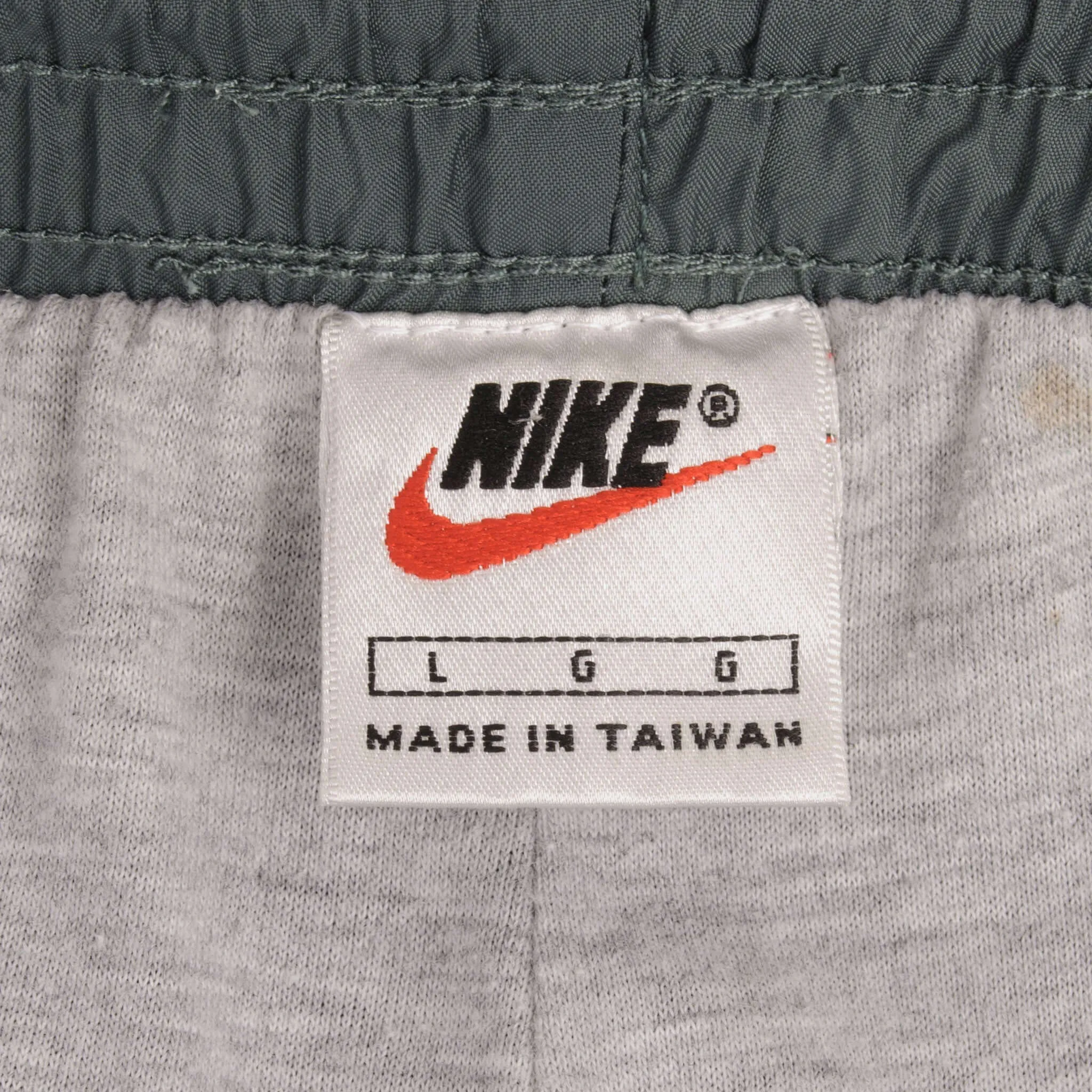 VINTAGE NIKE CLASSIC SWOOSH GREEN NYLON TRACK PANTS 1990S SIZE LARGE